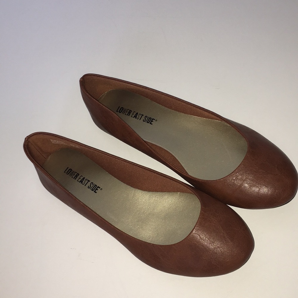 Woman’s brown flats